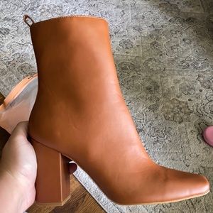 Selling these SHEIN boots. Size 11, never been worn. A little snug around ankles